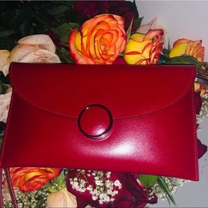 Classic red leather clutch